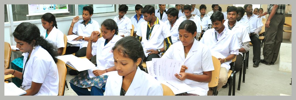 Sri Ganesh students using lab equipments in CISCO Lab